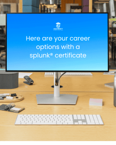 Monitor on a wooden desk displaying a blue screen with the text 'Here are your career options with a splunk certificate' and a small logo