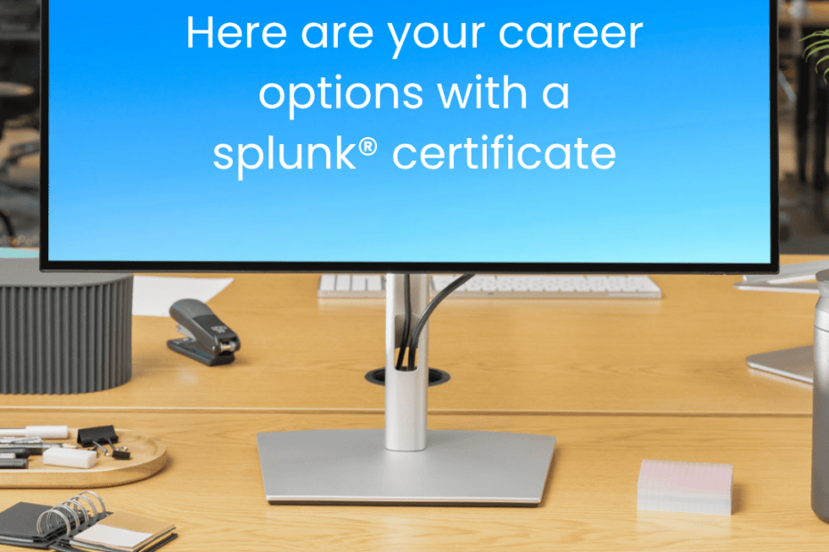 Monitor on a wooden desk displaying a blue screen with the text 'Here are your career options with a splunk certificate' and a small logo
