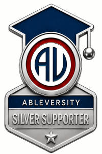 Silver Ableversity Supporter badge featuring a blue graduation cap and circular emblem with the initials in blue and white, plus a star at the bottom.
